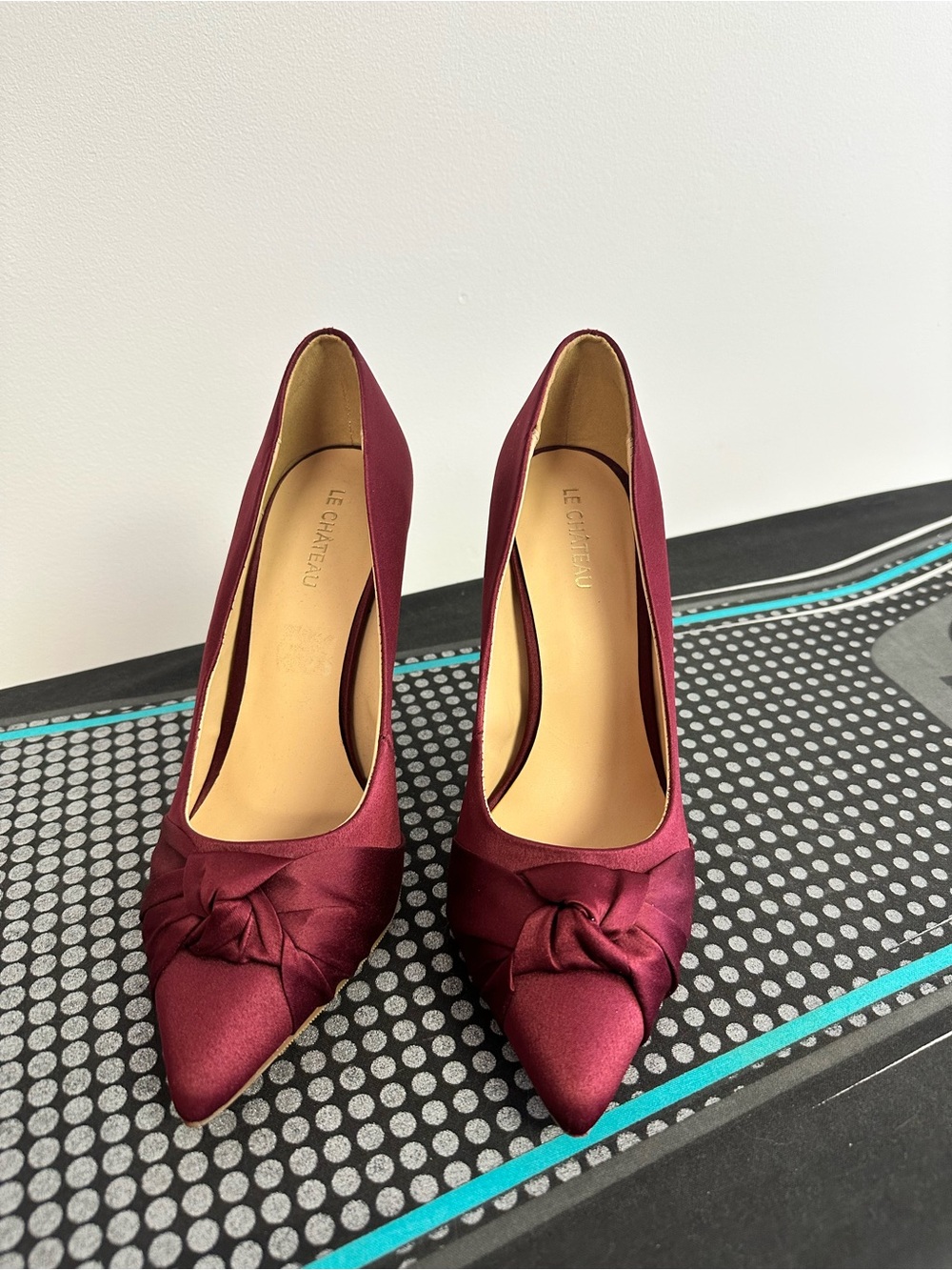 le chateau Women's Wine Satin Knotted Pointed-Toe Pumps